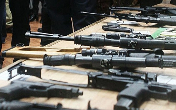 Polis xeyli silah-sursat aşkarladı - Pulemyot da var