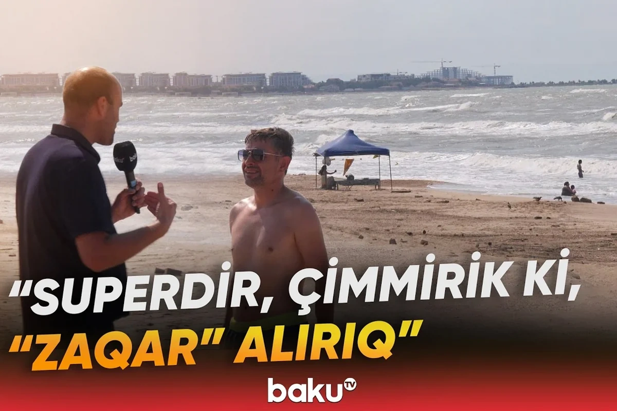 Küləkli havada özlərini riskə atanlar danışdı: "Bir balaca irəli getsən, dəniz aparar" - VİDEO