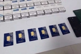 Mobil telefonda gizlədilmiş qızıl külçələr aşkarlanıb - FOTO