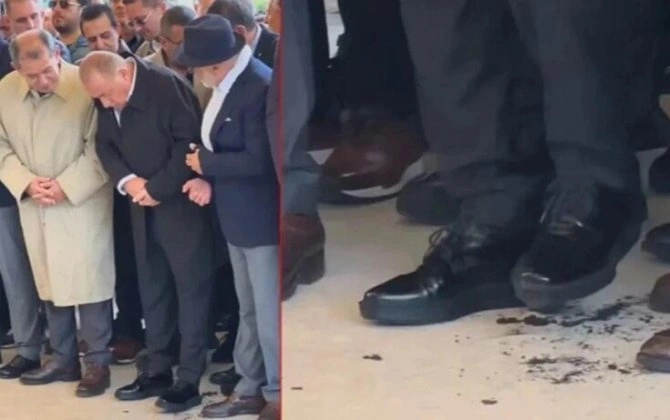 Fatih Terimin ayaqqabısı dəfndə parçalandı