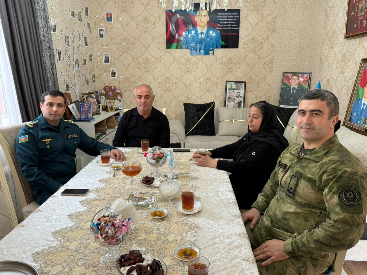 Dövlət Sərhəd Xidmətinin rəhbərliyi şəhid ailələrini ziyarət etdi - FOTOLAR